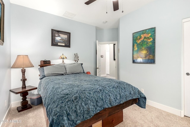 bedroom with a ceiling fan, carpet, and baseboards