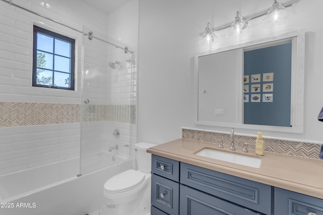 full bathroom with toilet, tasteful backsplash, washtub / shower combination, and vanity