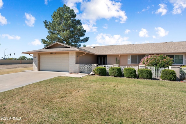 ranch-style house with a front yard, a porch, concrete driveway, a garage, and brick siding