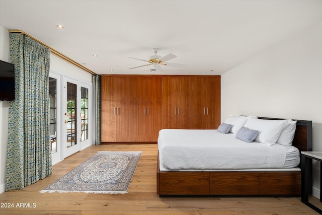 bedroom featuring access to exterior, ceiling fan, french doors, and light hardwood / wood-style floors