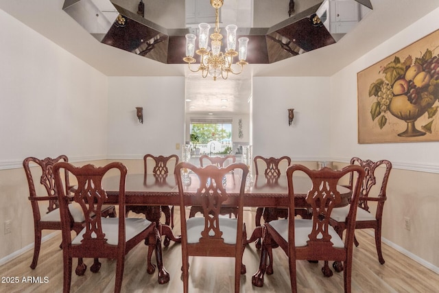 5237 N 106th Ave, Glendale, AZ 85307 - dining space with light wood-type flooring and a chandelier