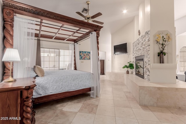 5237 N 106th Ave, Glendale, AZ 85307 - bedroom with a glass covered fireplace and light tile patterned flooring