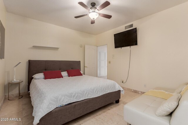5237 N 106th Ave, Glendale, AZ 85307 - bedroom with light tile patterned floors and ceiling fan