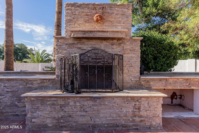 5237 N 106th Ave, Glendale, AZ 85307 - view of patio with an outdoor stone fireplace