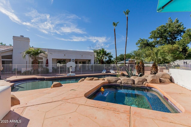 5237 N 106th Ave, Glendale, AZ 85307 - view of swimming pool with a hot tub and a patio area