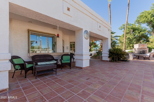 5237 N 106th Ave, Glendale, AZ 85307 - view of patio / terrace featuring an outdoor fireplace