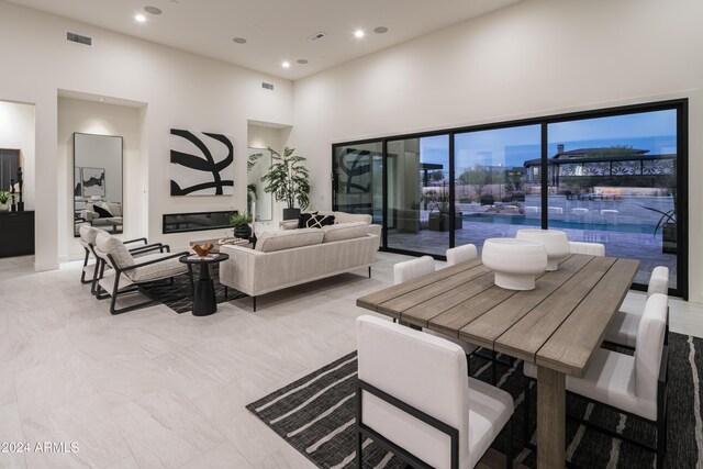 living room with a high ceiling