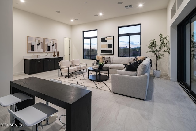 living room featuring sink