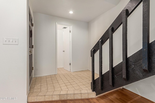 entrance foyer featuring recessed lighting, light wood-style floors, and baseboards