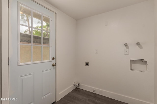 laundry room with baseboards, dark wood-style flooring, electric dryer hookup, and hookup for a gas dryer