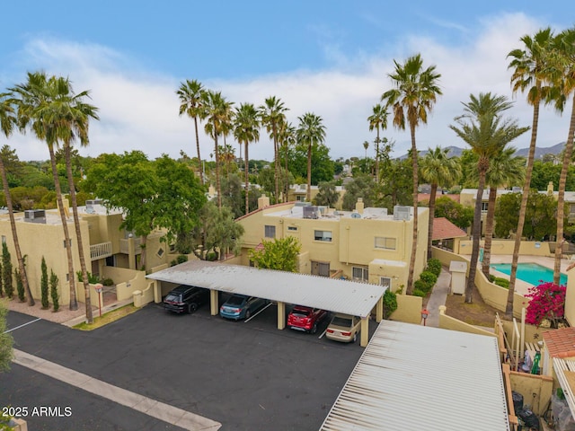 drone / aerial view of a pool area