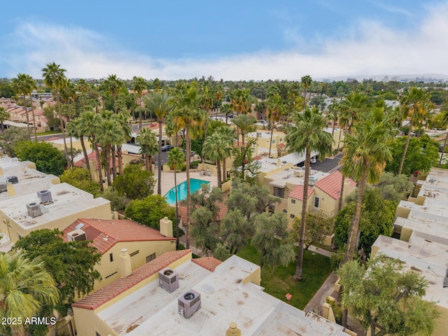 aerial view of residential area featuring a pool area