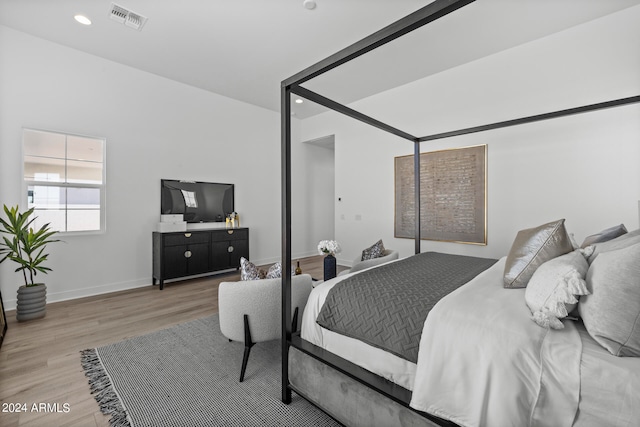 bedroom featuring light hardwood / wood-style flooring