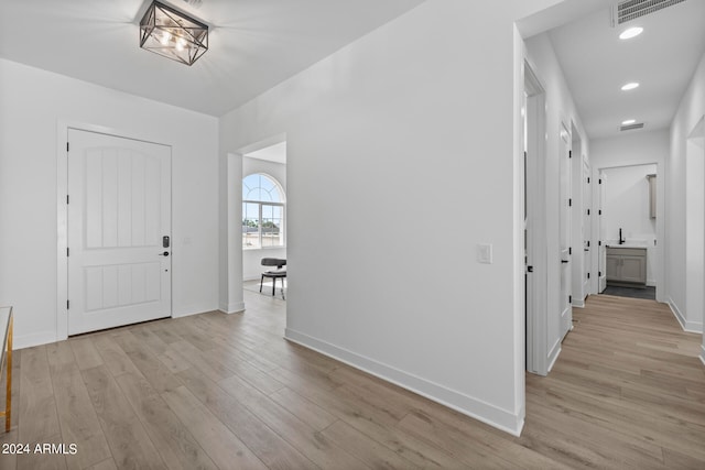 foyer entrance featuring light hardwood / wood-style floors