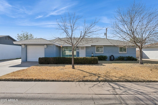 ranch-style home with a garage