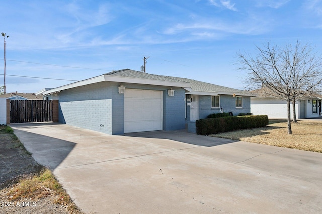 ranch-style home featuring a garage