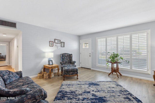 living room featuring light wood-type flooring