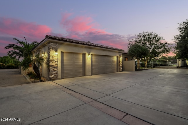 view of property exterior at dusk