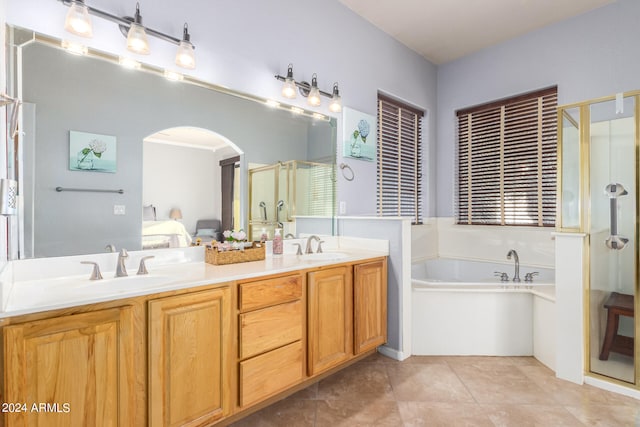 bathroom featuring separate shower and tub, tile patterned floors, and vanity