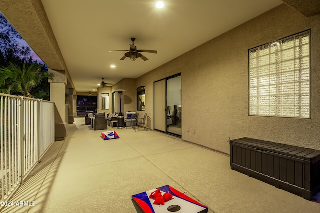 view of patio / terrace featuring ceiling fan