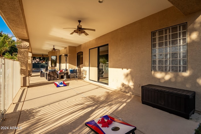 view of patio featuring ceiling fan