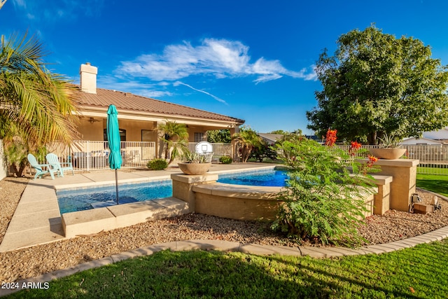 view of swimming pool with a patio area