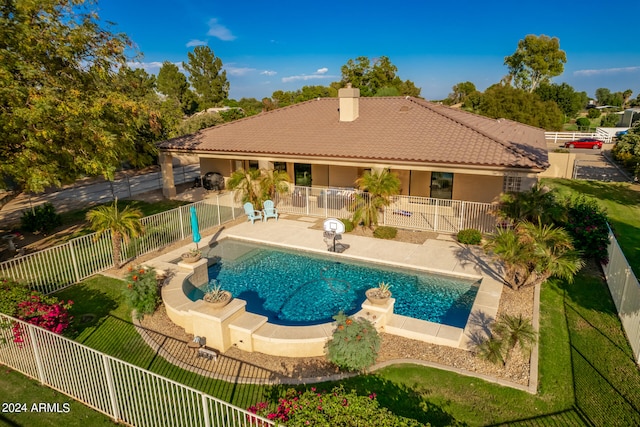 view of swimming pool featuring a patio