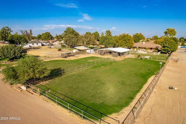 birds eye view of property featuring a rural view