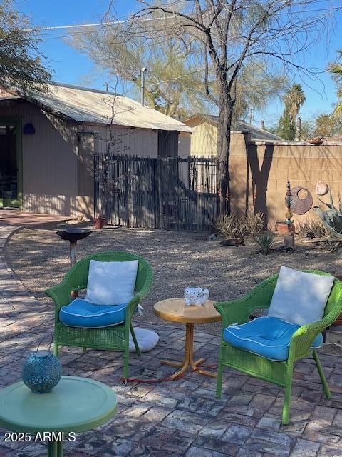 view of patio / terrace with fence