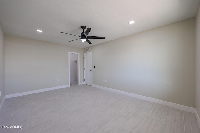 empty room with ceiling fan