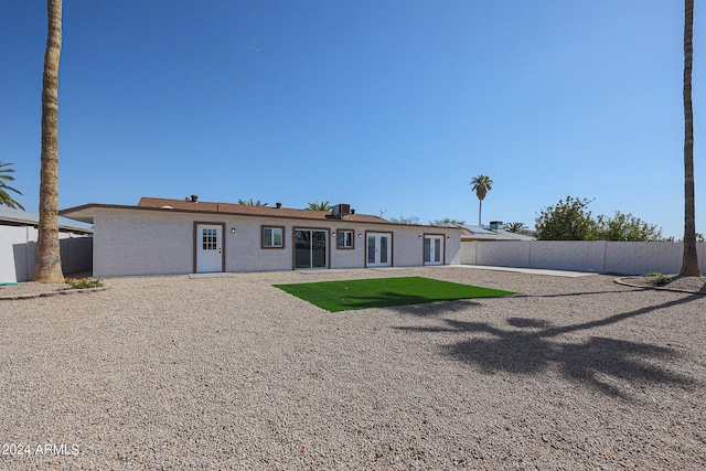 rear view of house featuring a patio