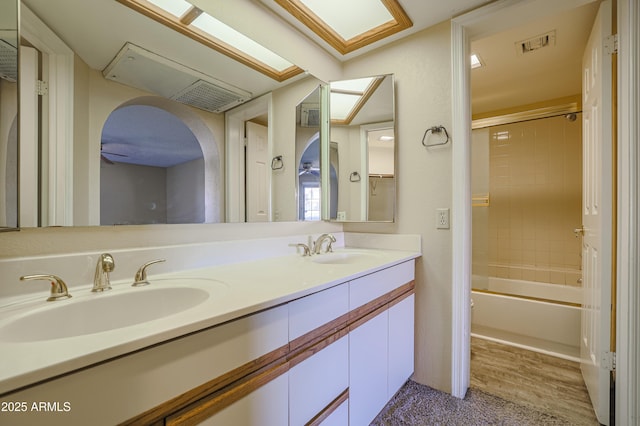 10410 N Cave Creek Rd Unit 2220, Phoenix, AZ 85020 - bathroom with double vanity, tub / shower combination, and ceiling fan