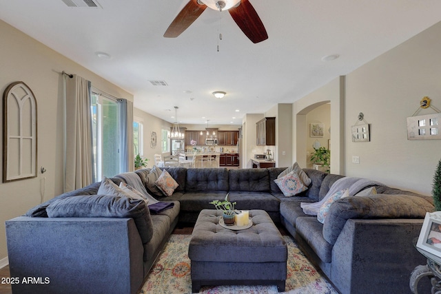 living room featuring ceiling fan