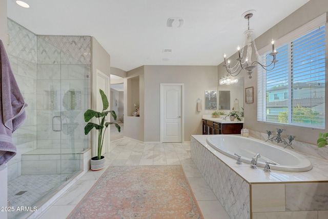 bathroom featuring vanity, an inviting chandelier, and plus walk in shower