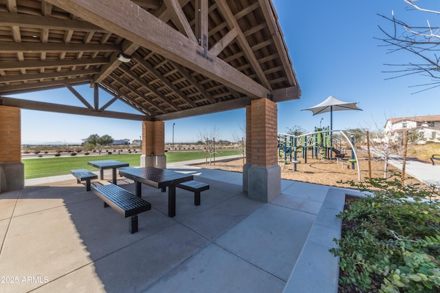 view of property's community with a playground and a gazebo