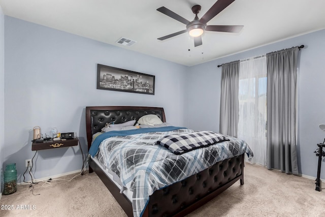 bedroom with ceiling fan and carpet flooring