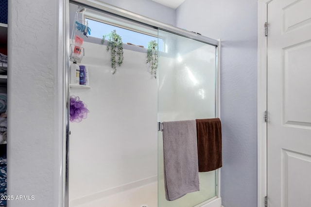 bathroom with an enclosed shower