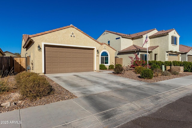 mediterranean / spanish-style house featuring a garage