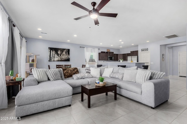 living room featuring ceiling fan