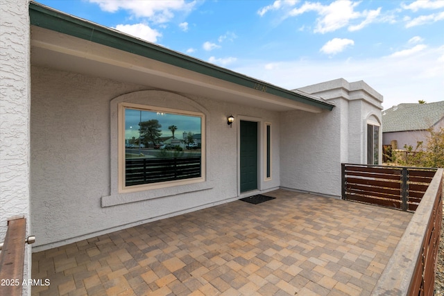 view of patio with a balcony