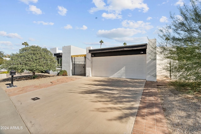 view of property exterior with a garage