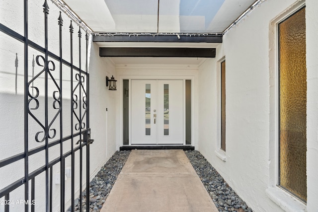 entrance to property featuring french doors