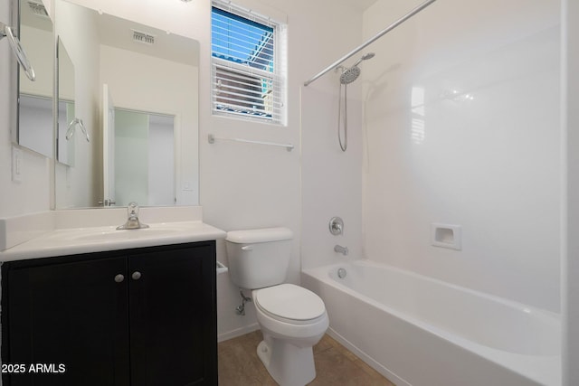 full bathroom featuring toilet, vanity, and  shower combination