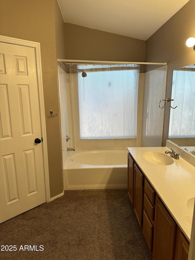 bathroom featuring vanity and plus walk in shower