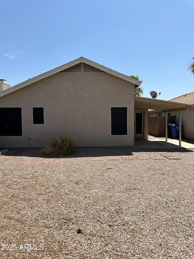 rear view of property with a patio