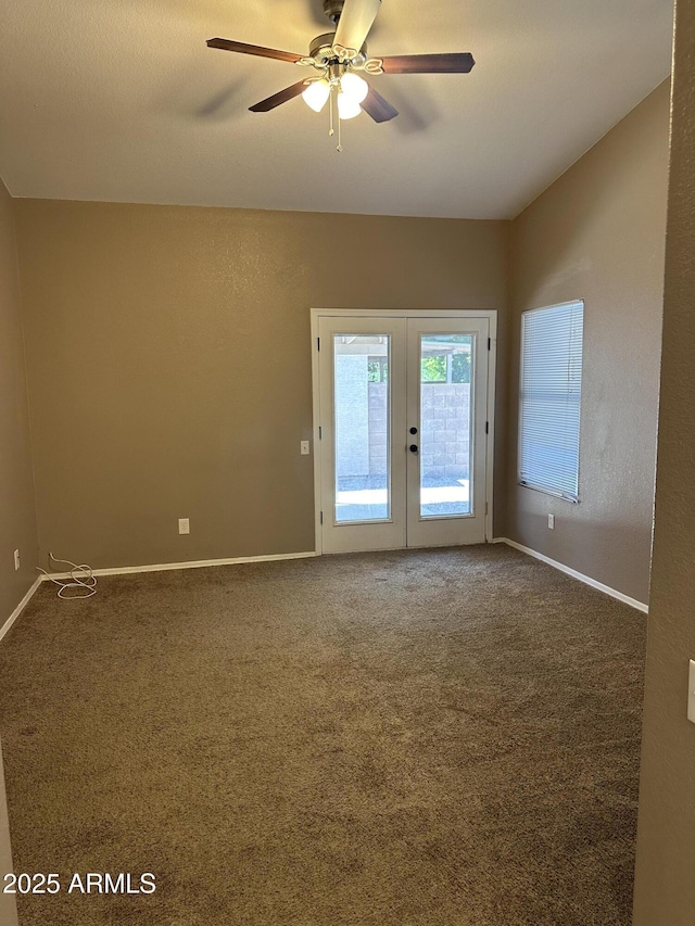 unfurnished room with carpet floors, french doors, and ceiling fan