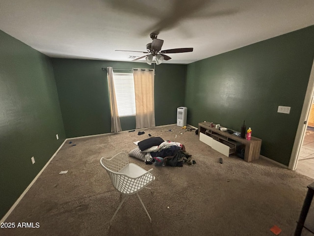 unfurnished bedroom with ceiling fan and carpet flooring