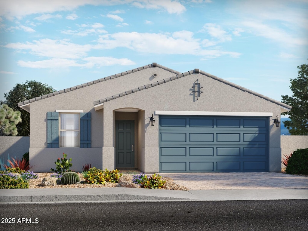 view of front of property with a garage