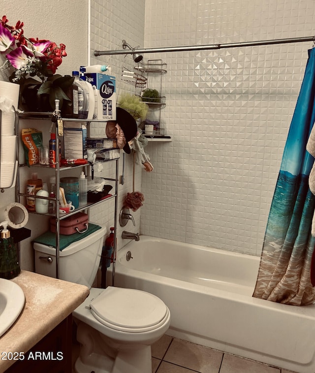 full bathroom featuring tile patterned flooring, vanity, shower / tub combo, and toilet