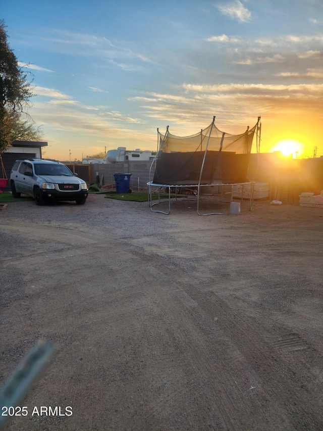 view of yard with a trampoline